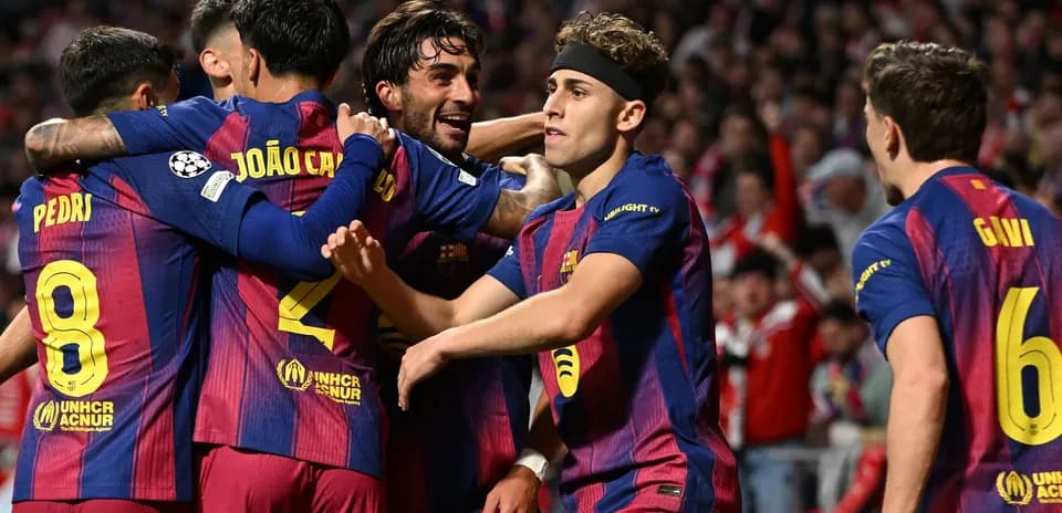 Barcelona players celebrating a goal during match