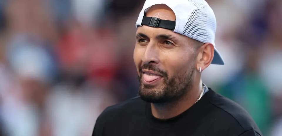 Tennis player smiling during match at stadium