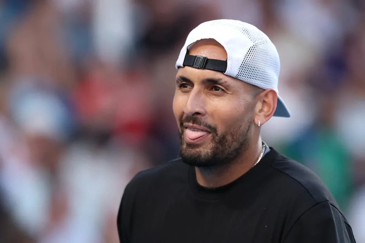 Tennis player smiling during match at stadium