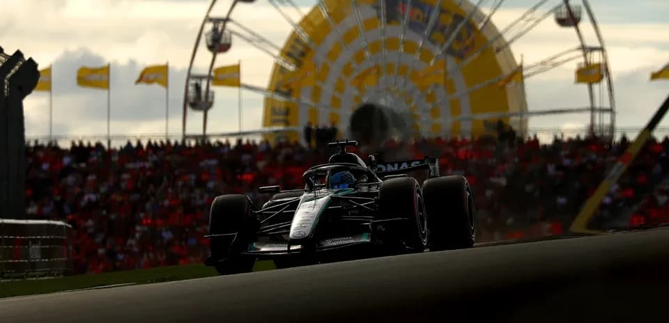 Formula 1 car racing with ferris wheel background