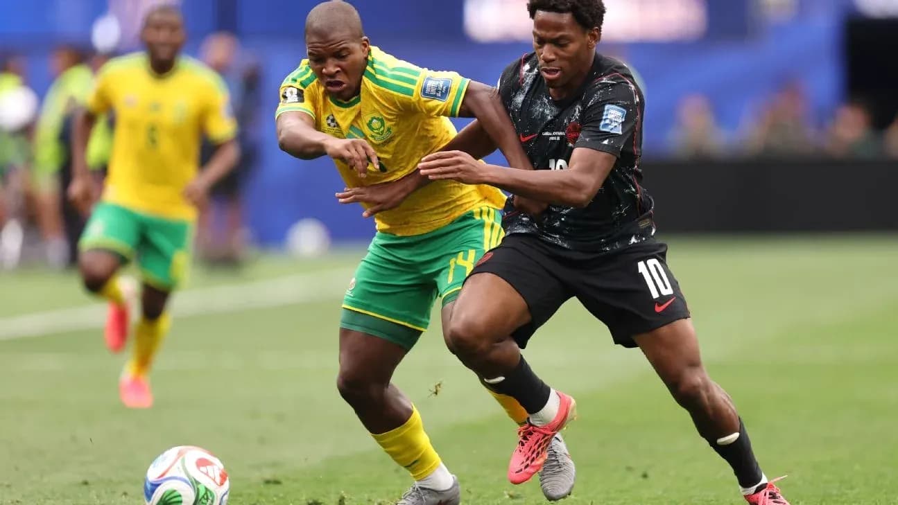 Two players battling for the ball during match
