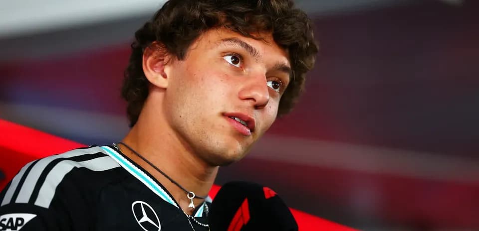 Young driver speaking at press conference with microphone