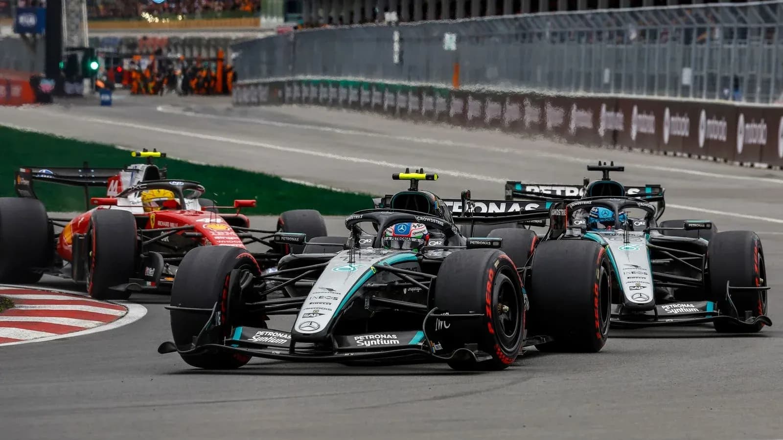 Formula 1 cars racing on track during competition