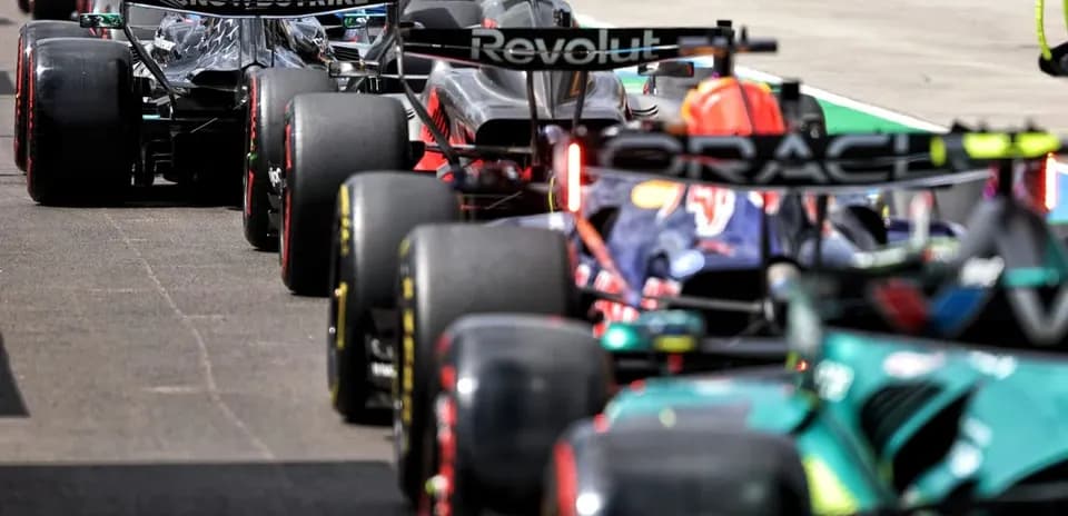 Formula 1 cars lined up on the grid