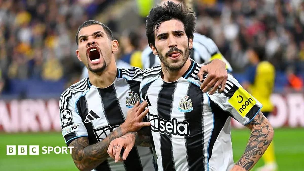 Newcastle players celebrating a goal on the field