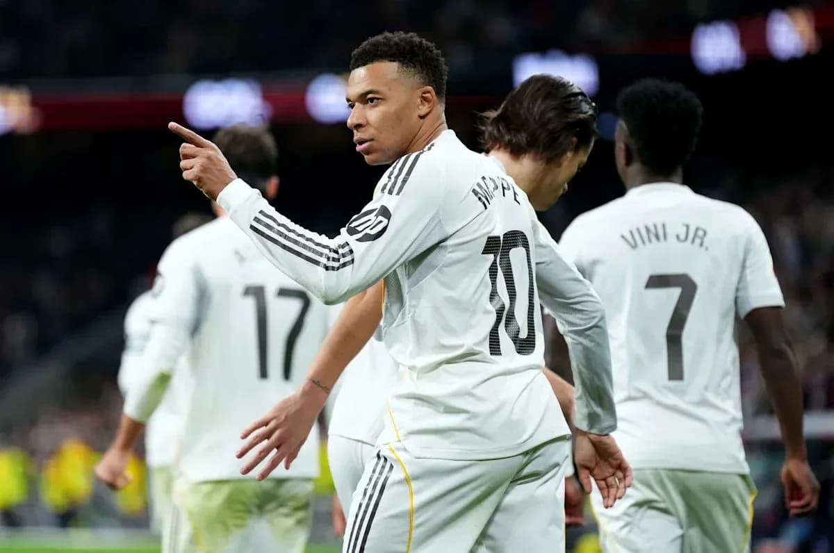 Kylian Mbappé celebrating with teammates after scoring