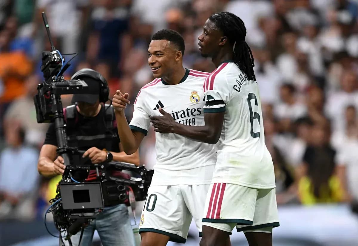 Mbappé celebrating with Camavinga during match