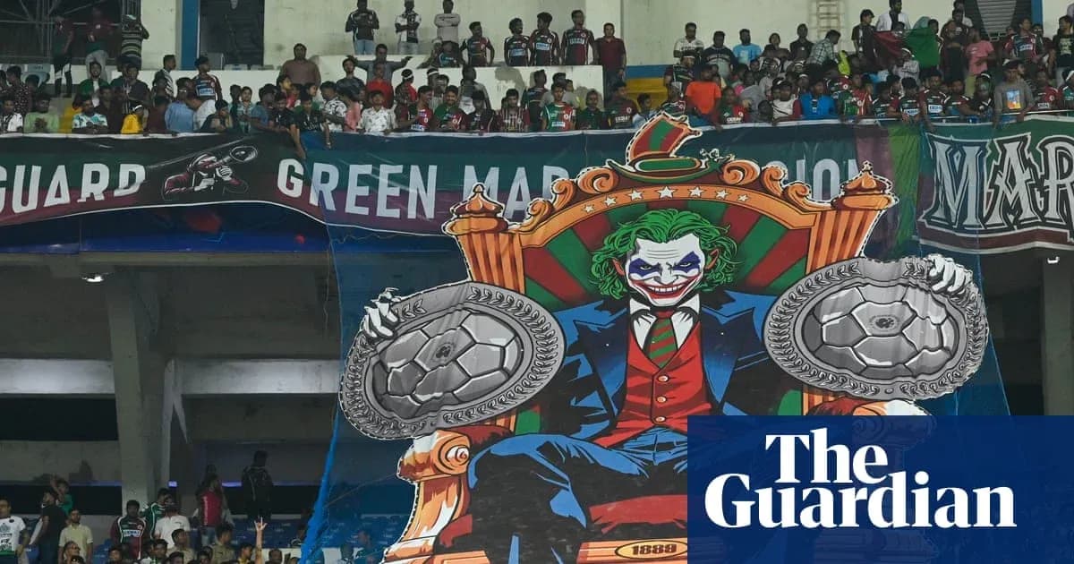 Fan banner featuring Joker character at football match