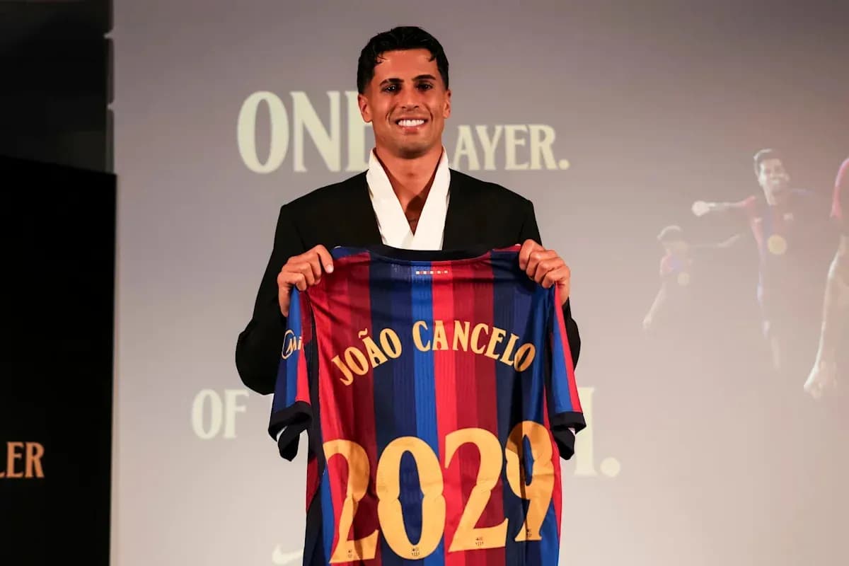 João Cancelo presenting Barcelona jersey at event