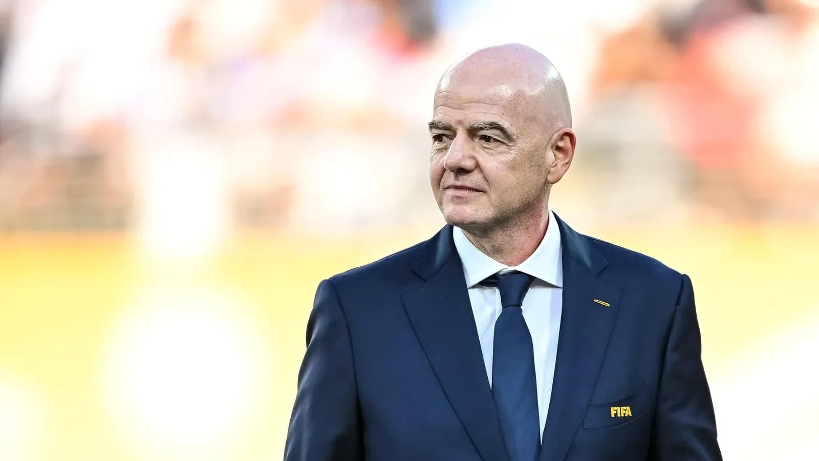 FIFA official in suit at event venue