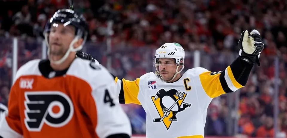 Player celebrating a goal in hockey match