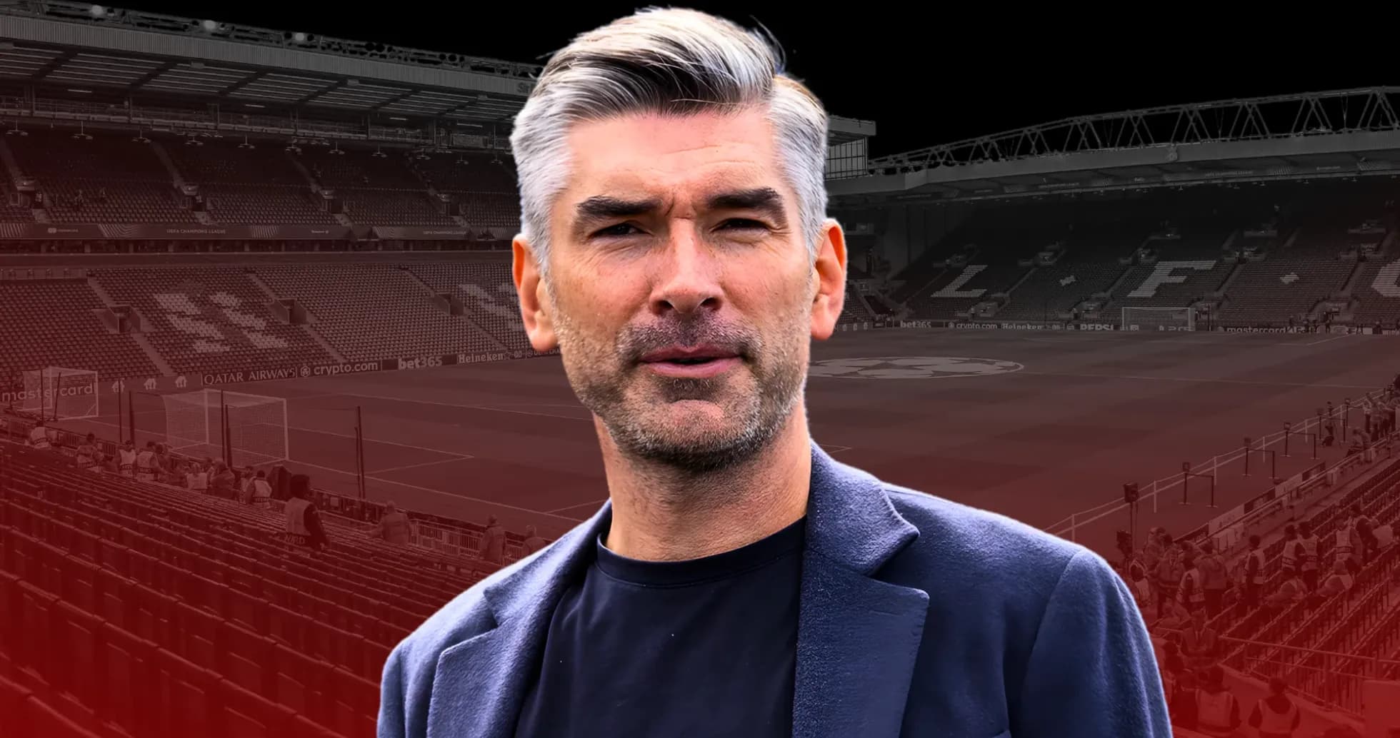 Man in front of football stadium with empty seats