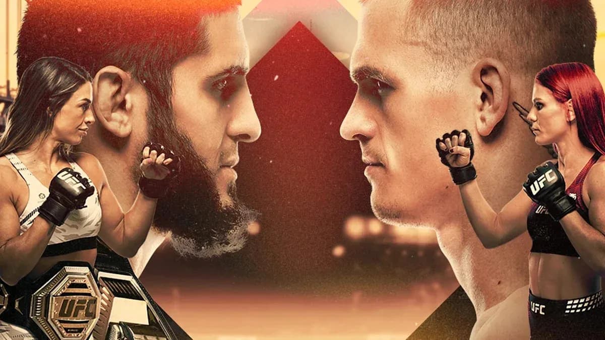 UFC fighters facing off with championship belt
