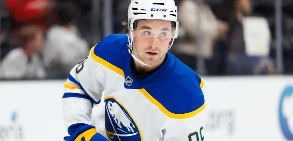Hockey player in Buffalo Sabres uniform on ice