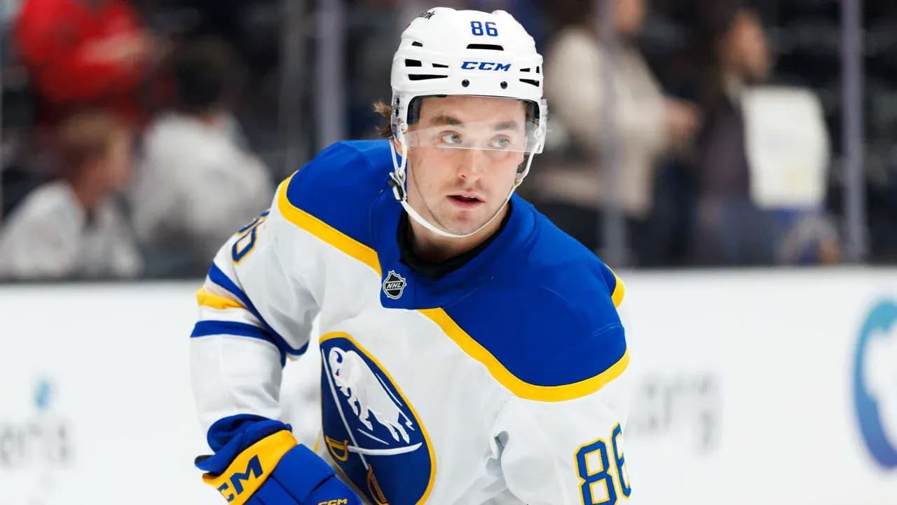 Hockey player in Buffalo Sabres uniform on ice