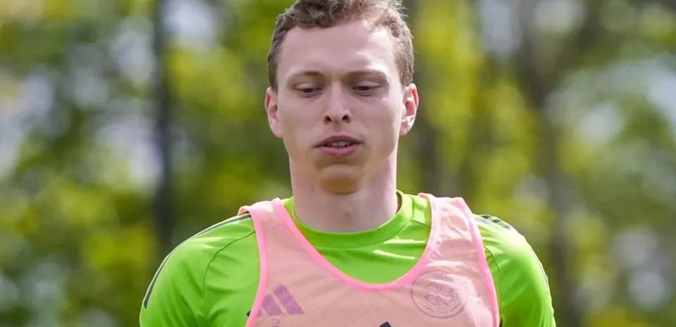 Goalkeeper training in pink vest during practice