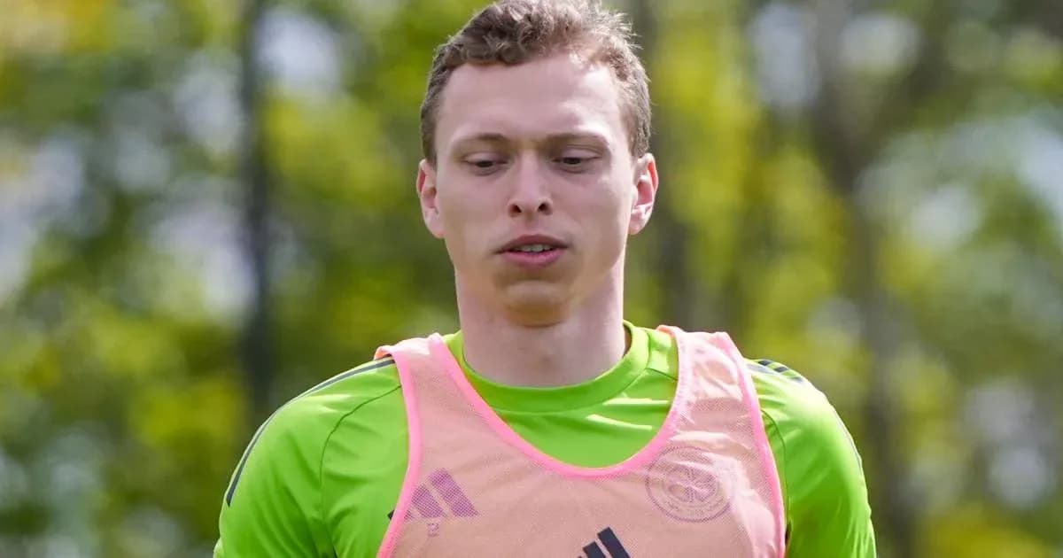 Goalkeeper training in pink vest during practice