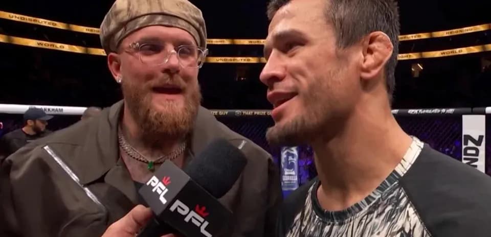 Two men speaking during post-fight interview