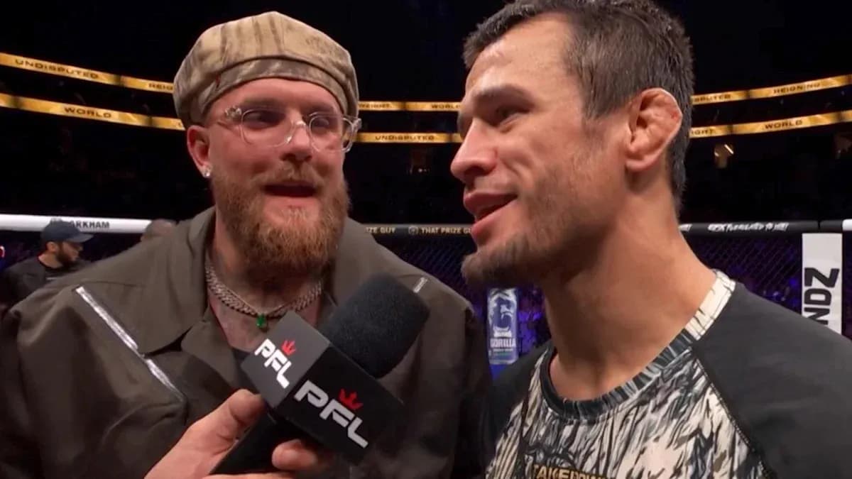 Two men speaking during post-fight interview