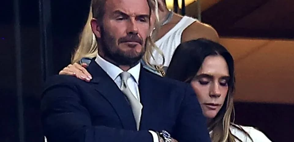 David Beckham and Victoria Beckham at event