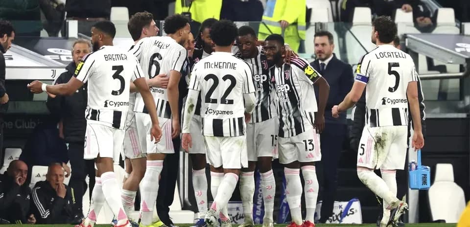 Juventus players celebrating together on the pitch