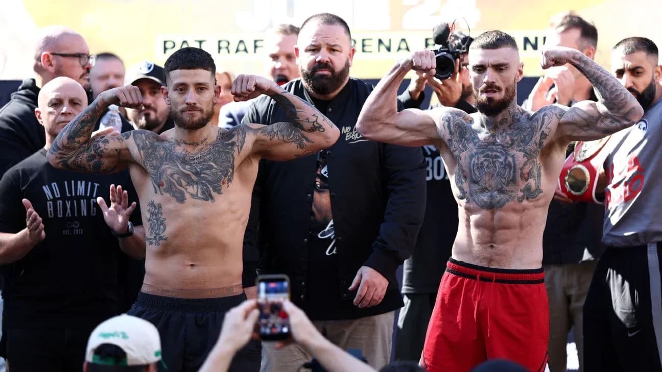 Boxers flexing muscles during weigh-in event