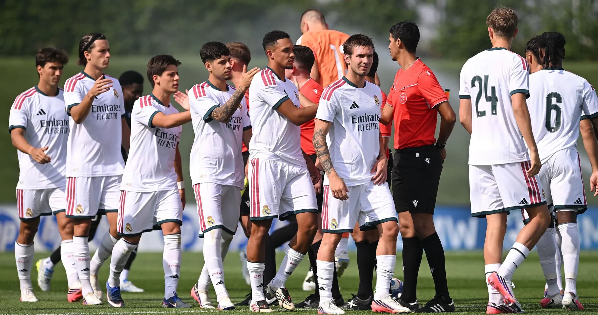 Real Madrid players greeting each other before match