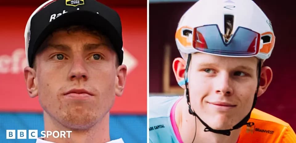 Two cyclists posing for a photo, wearing helmets