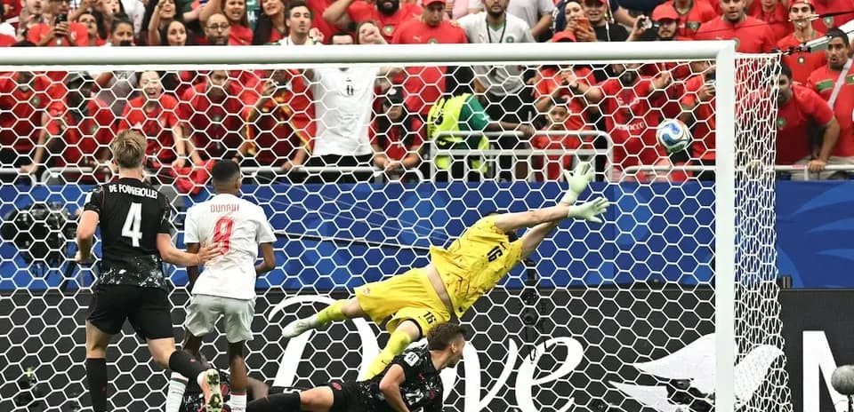 Goalkeeper diving to save a penalty kick