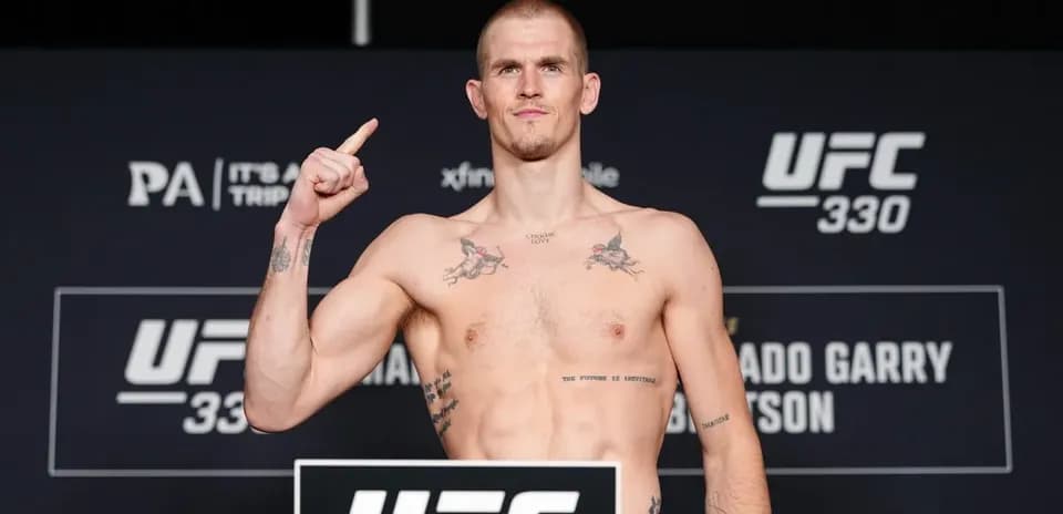 Fighter posing at UFC 330 weigh-in event