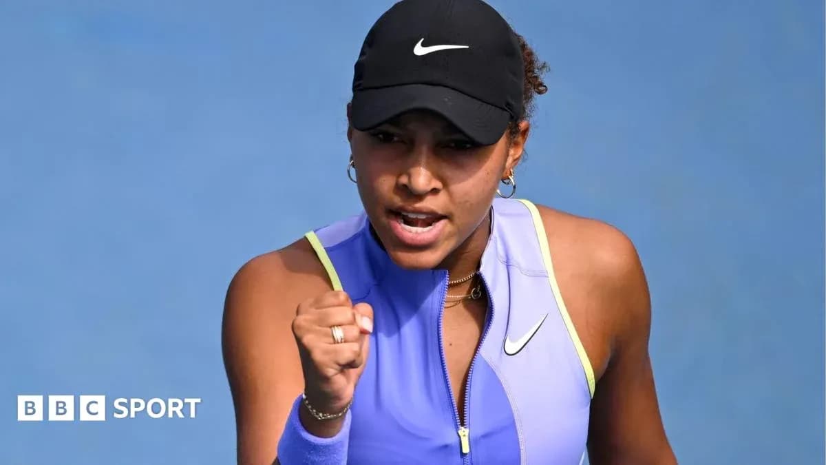 Tennis player celebrating a point during match