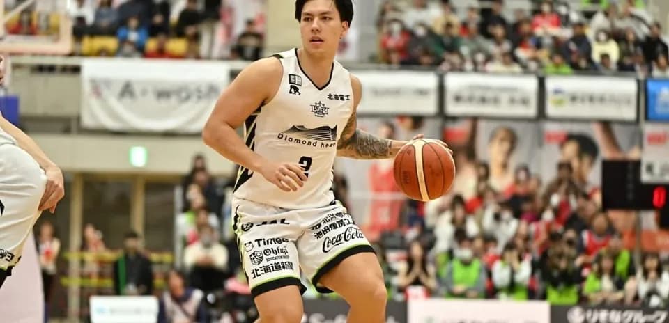 Basketball player dribbling ball during a game