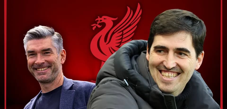 Two smiling coaches with Liverpool logo background