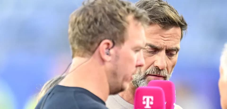 Interviewer and guest discussing before the match