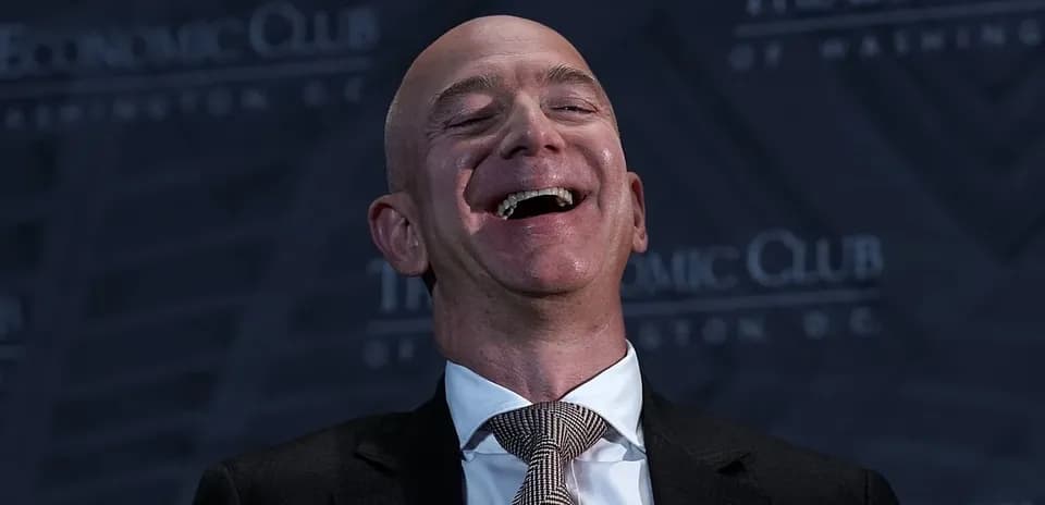 Man laughing at The Economic Club event