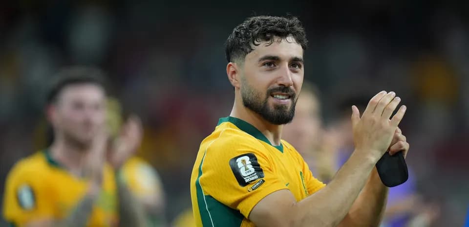 Futbolchi jamoani qo'llab-quvvatlayotgan payt