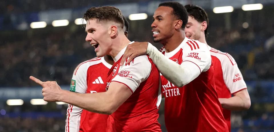 Arsenal players celebrating a goal together