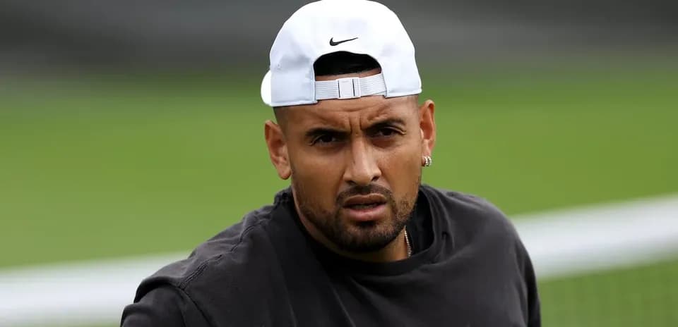 Tennis player wearing cap during practice session