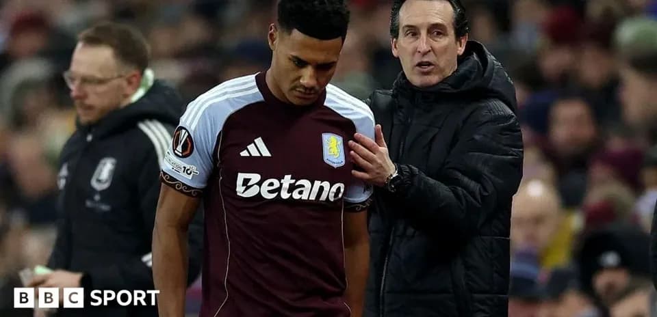 Aston Villa player receiving instructions from manager