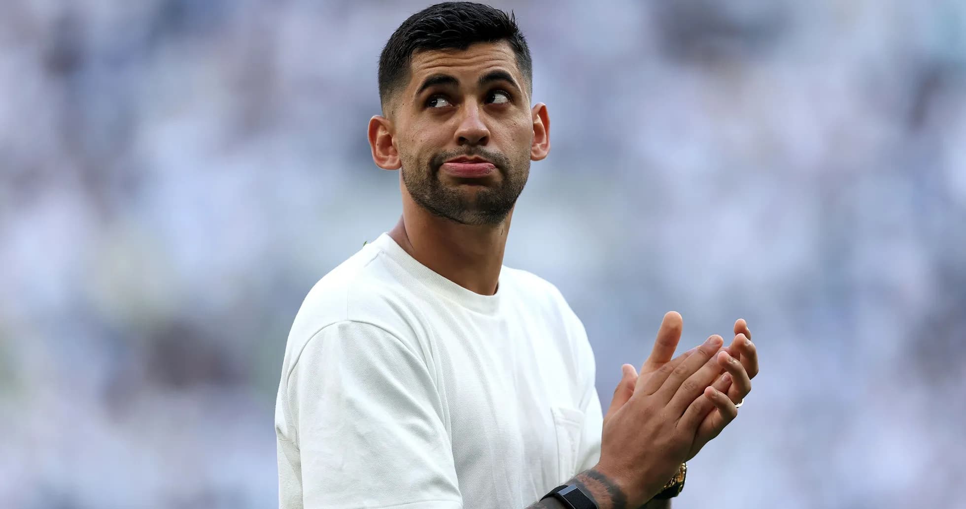 Player applauding during a match warm-up
