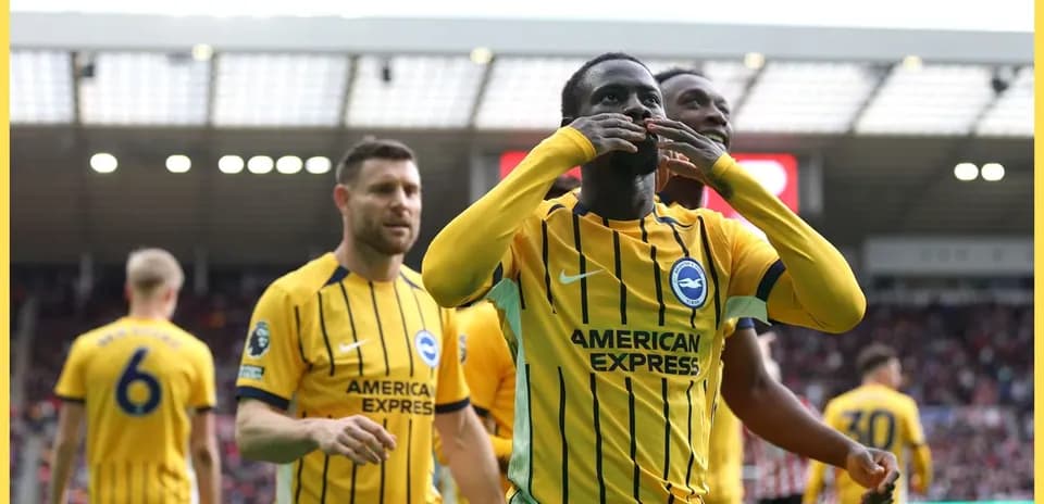 Brighton players celebrating a goal in match