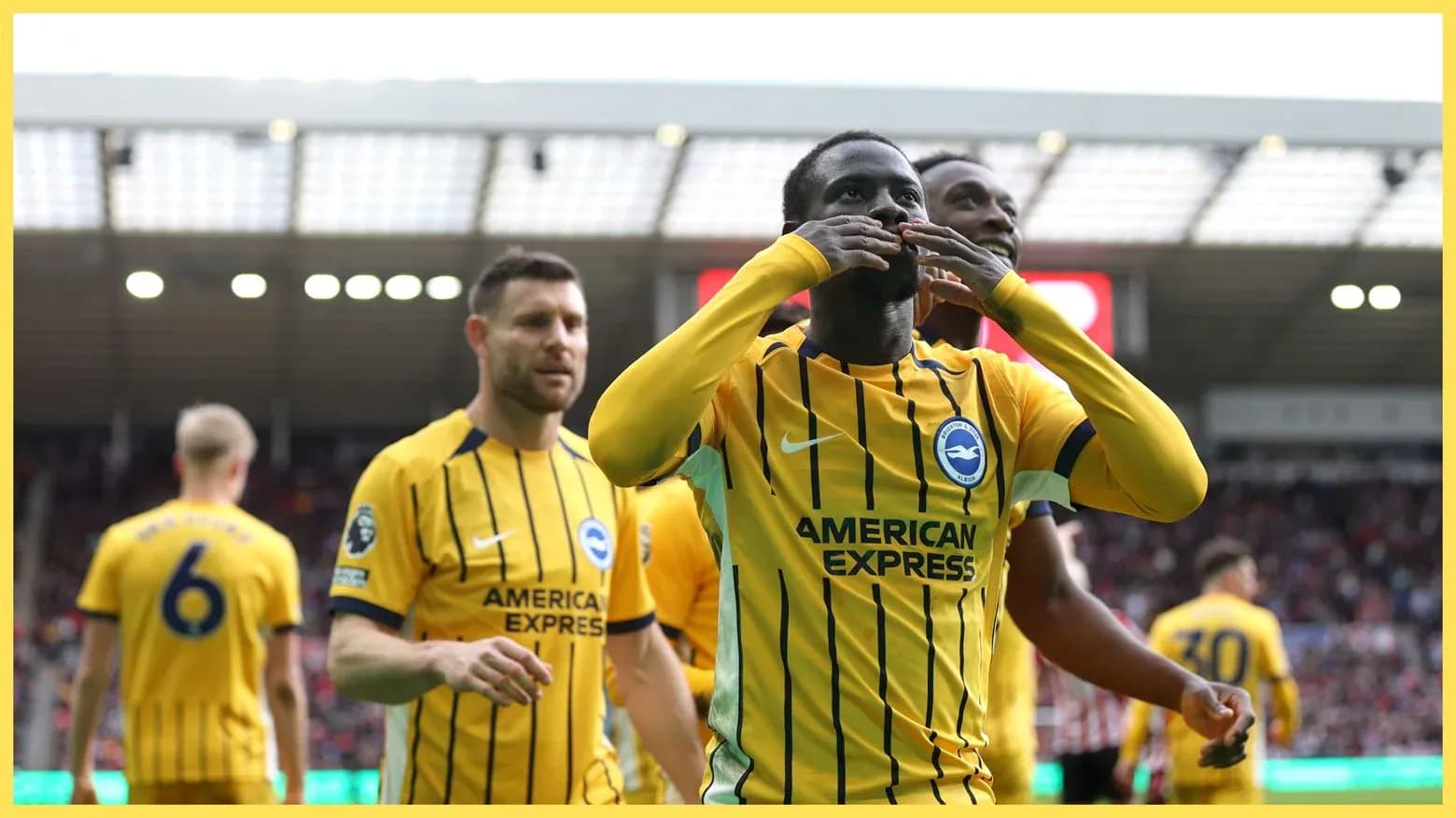 Brighton players celebrating a goal in match