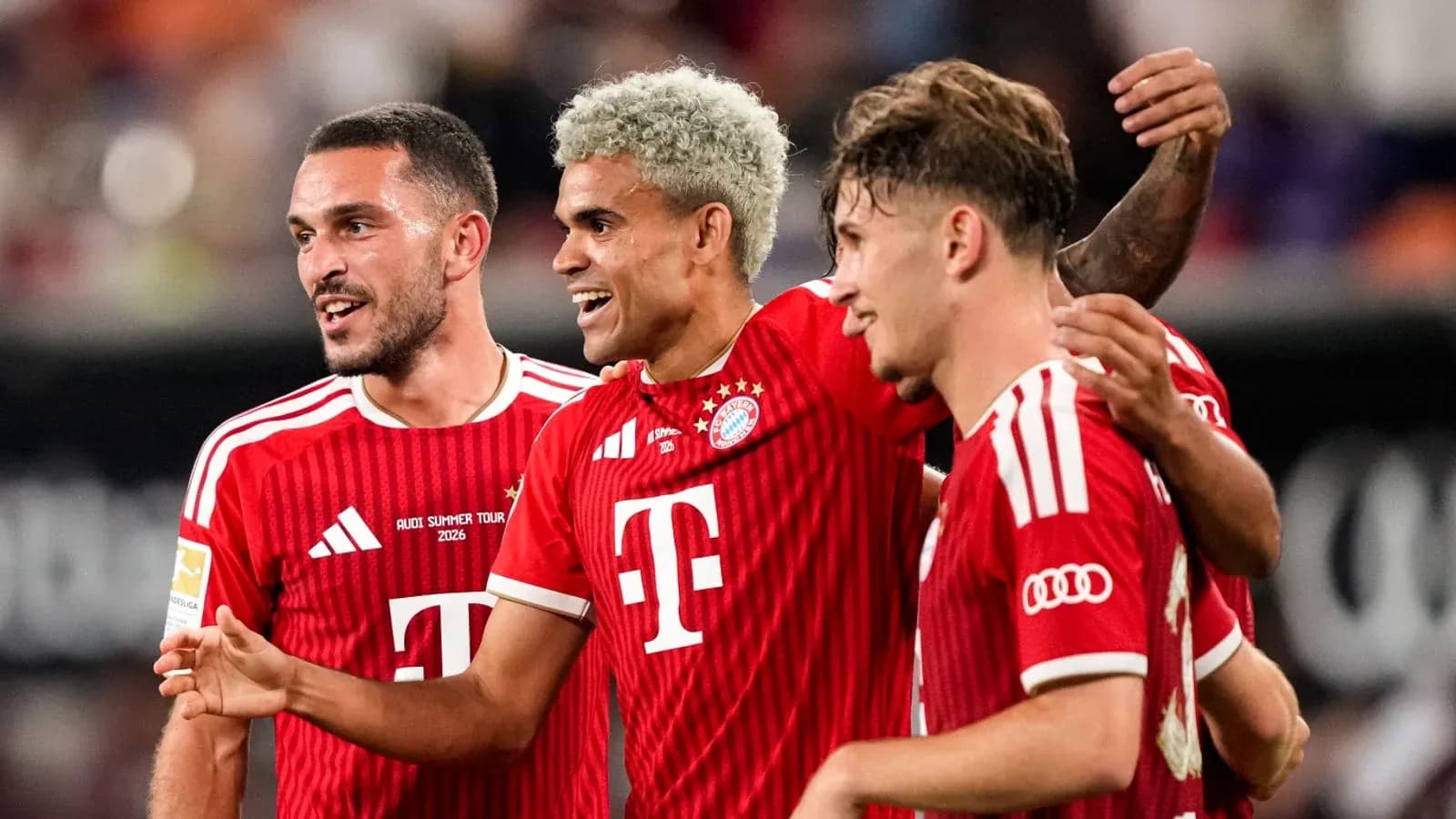 Bayern Munich players celebrating a goal together