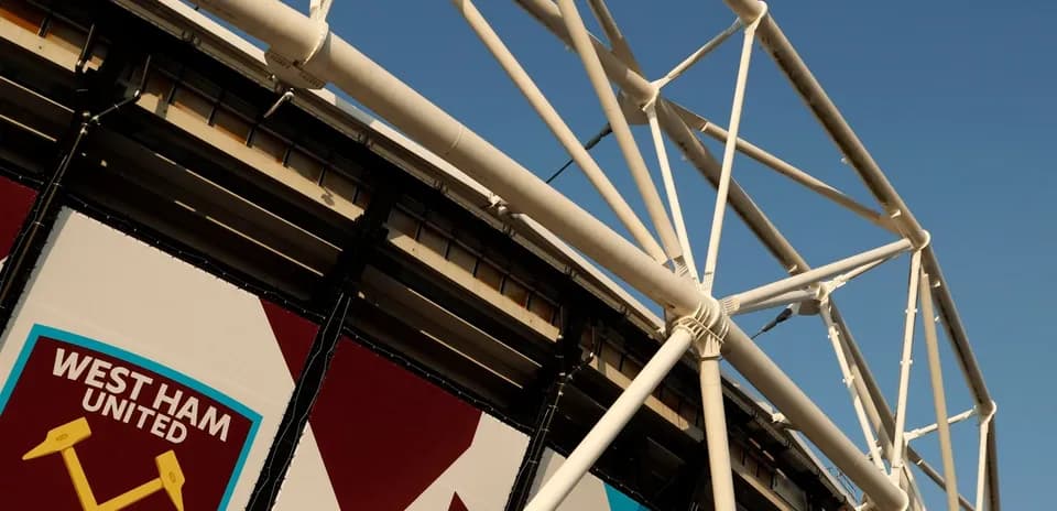 West Ham United stadium exterior with club logo