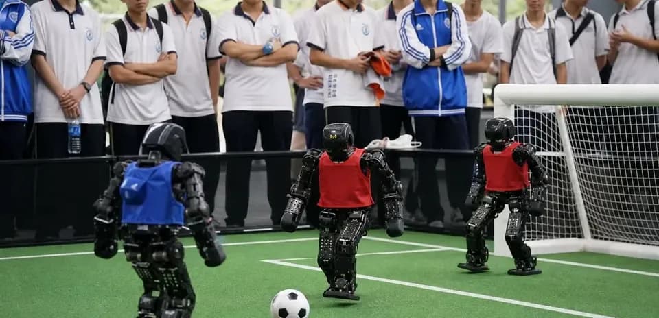 Robot soccer match with audience observing