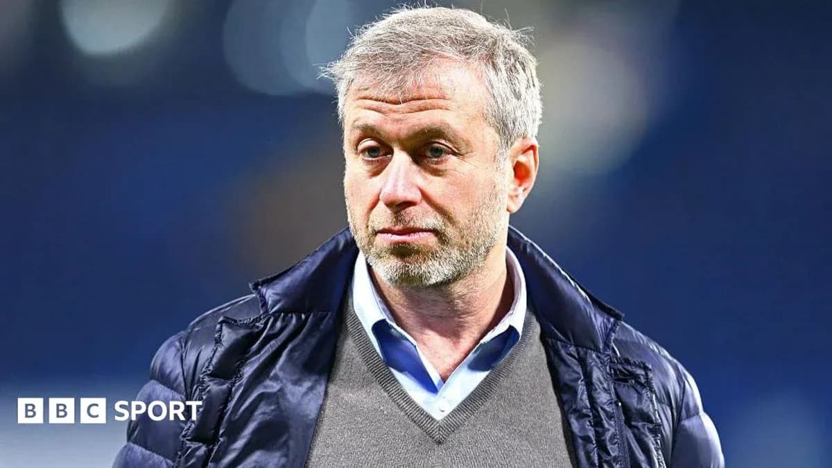 Man in a jacket during a sports event