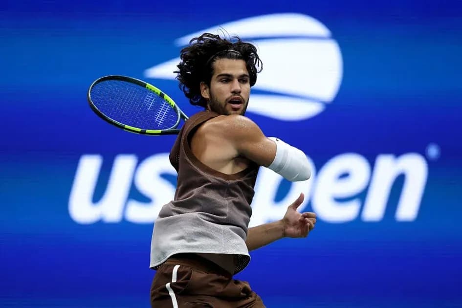 Tennis player hitting a backhand at US Open