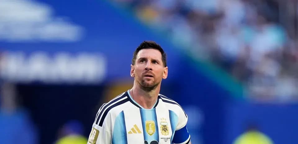 Lionel Messi looking up during a match