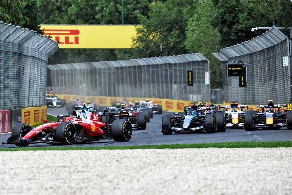 Formula 1 cars racing on track during competition