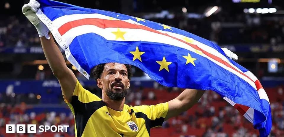 Goalkeeper celebrating with Cape Verde flag